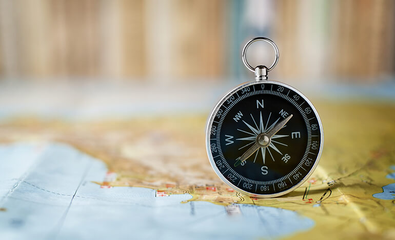 Compass on a map.